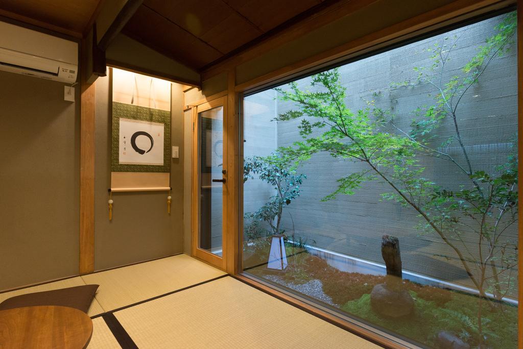 Вилла Kakishibu An Machiya House Киото Номер фото