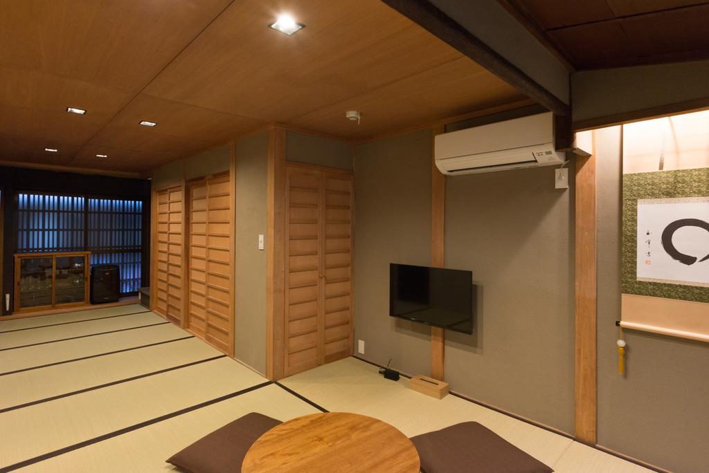 Вилла Kakishibu An Machiya House Киото Номер фото