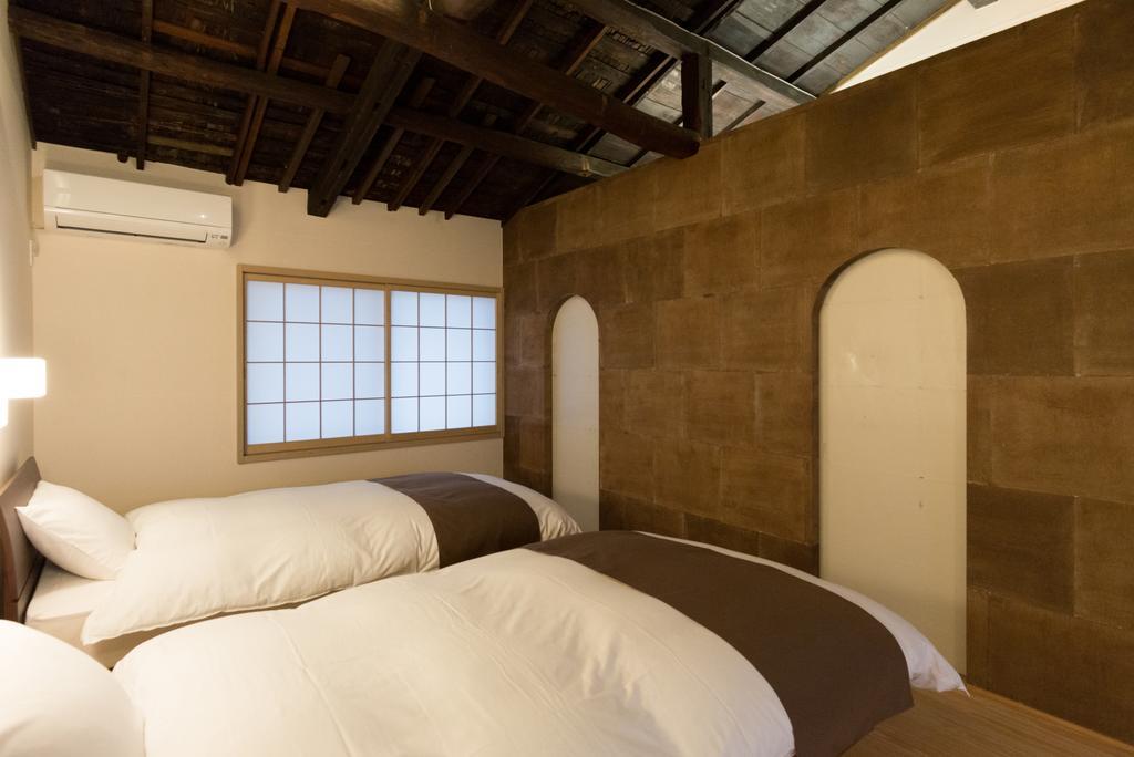 Вилла Kakishibu An Machiya House Киото Номер фото