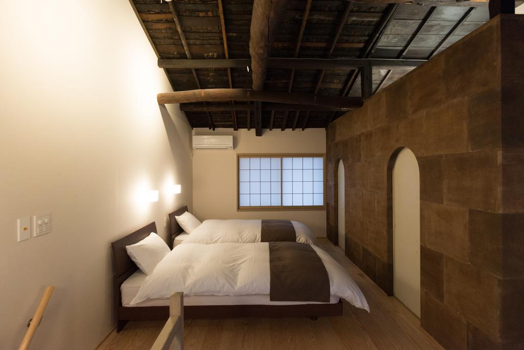 Вилла Kakishibu An Machiya House Киото Номер фото