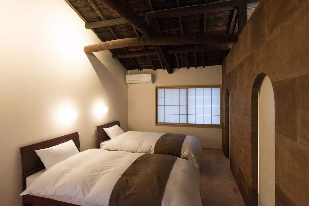 Вилла Kakishibu An Machiya House Киото Номер фото